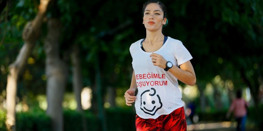 'Karnı burnunda' maratona hazırlanıyor