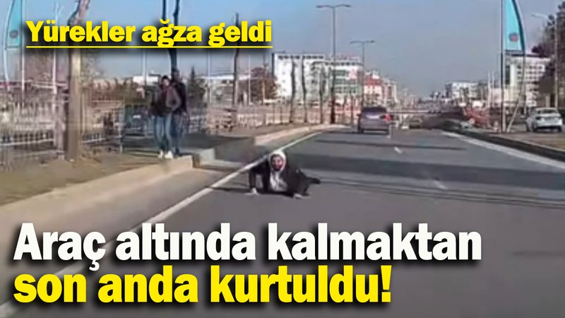 Araç altında kalmaktan  son anda kurtuldu