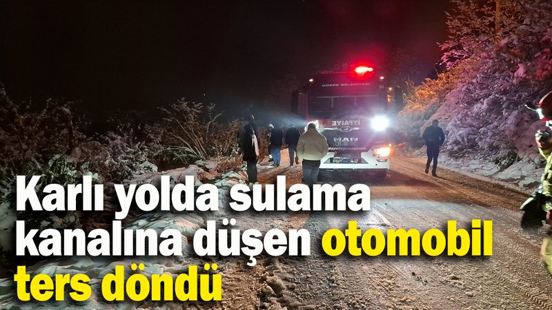 Düzce'de  feci kaza: Karlı yolda sulama kanalına düşen otomobil ters döndü