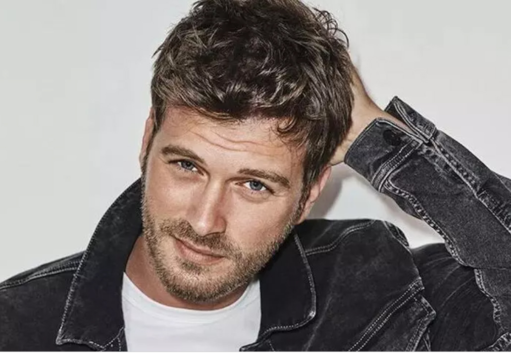 Tatlıtuğ eşi ve oğlunun doğum tarihini dövme yaptırdı