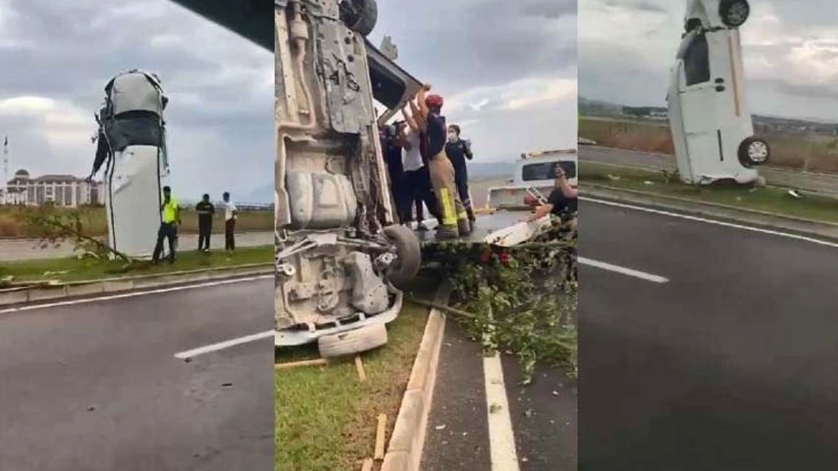 Bursa'da yağmur sebebiyle savrulan kamyonet refüjde dik durdu