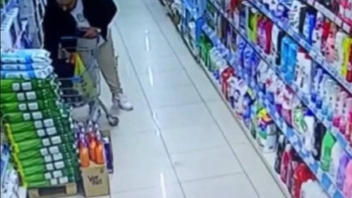 11 deodorant çaldığı marketten elini kolunu sallayarak çıktı