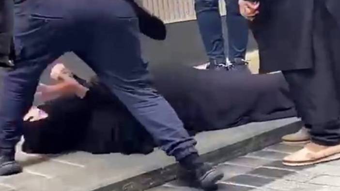 Fatih'te çarşaflı kadını yerde sürükleyen adam tutuklandı
