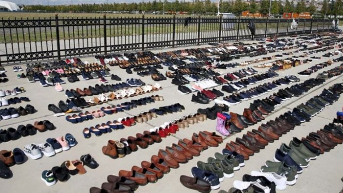 Selde ıslanan ayakkabılar Yenikapı'da kurutuluyor