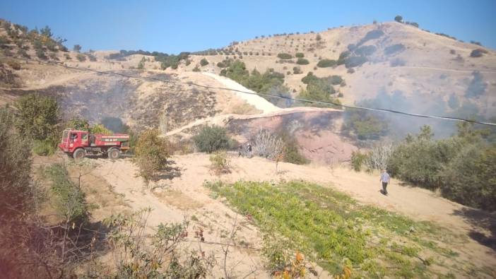 Alaşehir'de makilik alanda çıkan yangın büyümeden söndürüldü