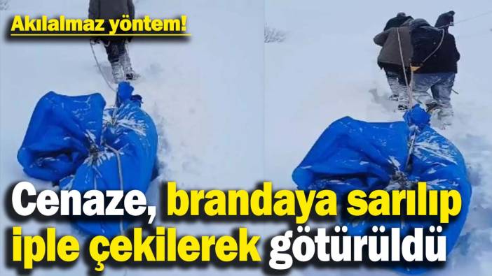 Görüntüler sosyal medyayı ikiye böldü! Cenaze, brandaya sarılıp iple çekilerek götürüldü
