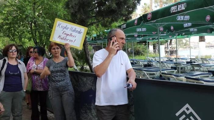Akyaka’da kıyıya özel işletme engeli: Vatandaşlar brandaları yırtarak plaja ulaştı