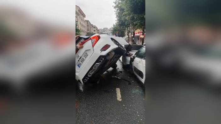 Esenyurt'ta otomobil uçtu: Park halindeki aracın üzerine devrildi