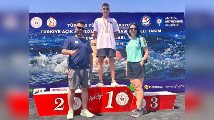 Milli yüzücü İbrahim Burhan, İl Müdürü Erdoğan'ı ziyaret etti