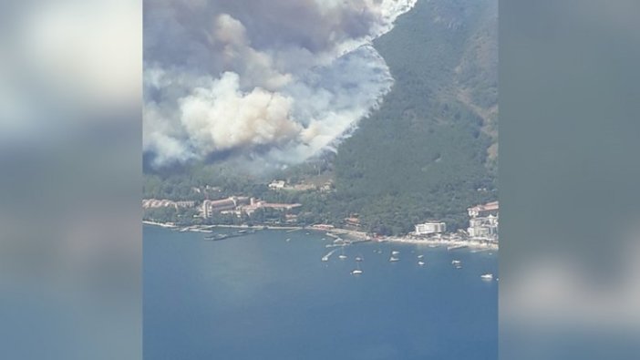Marmaris'te oteller ve yerleşim yerlerine yakın ormanlık alanda çıkan yangın kontrol altına alındı