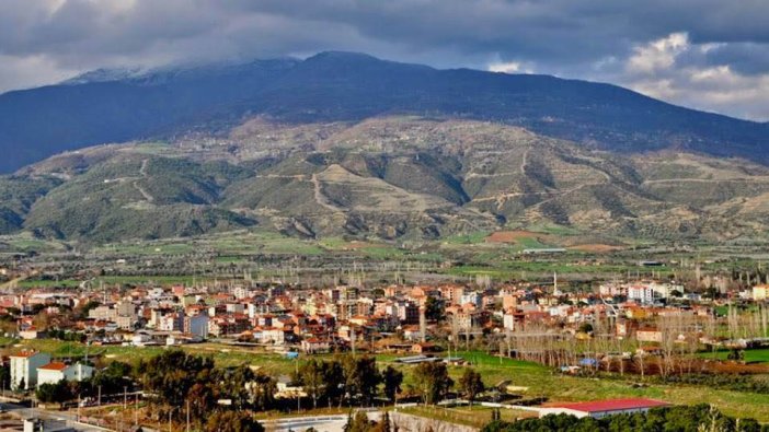 Kiraz'da 19.807 m² tarla ve üzerindeki tek odalı mesken icradan satılık