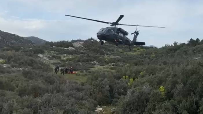 Dağlık alana düşen paraşütçüye jandarma helikopteriyle kurtarma