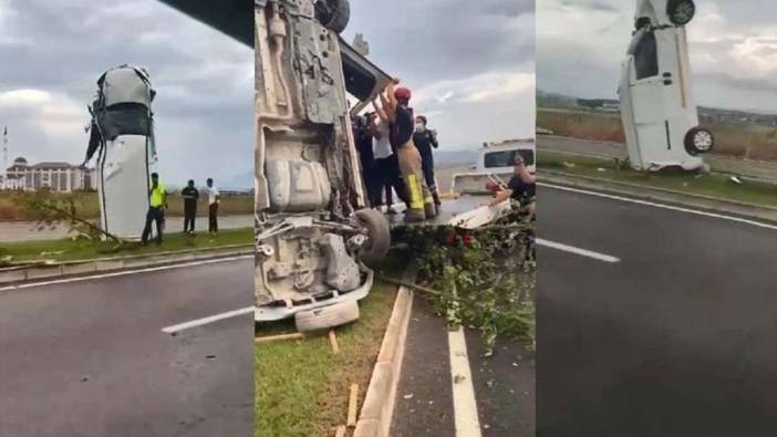 Bursa'da yağmur sebebiyle savrulan kamyonet refüjde dik durdu