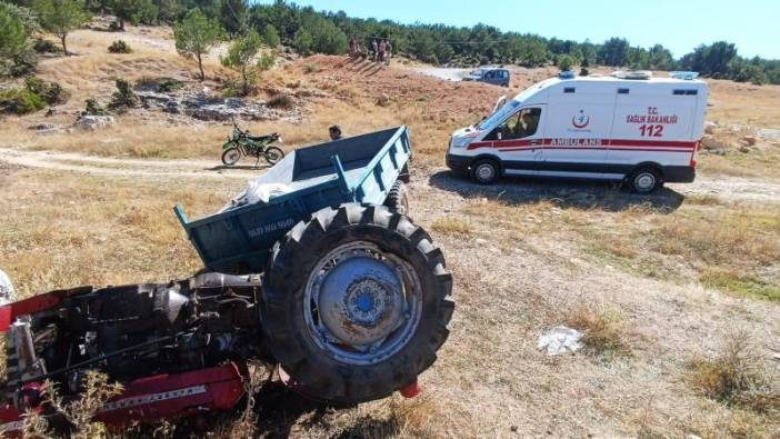 Traktörün devrilmesi sonucu 2 kişi yaralandı