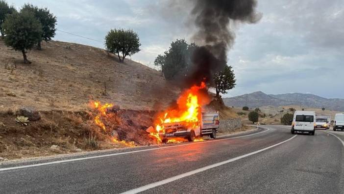 Alev topuna dönen araçtan son anda kurtuldu