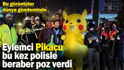 Bu görüntüler dünya gündeminde! Eylemci Pikaçu bu kez polisle beraber poz verdi