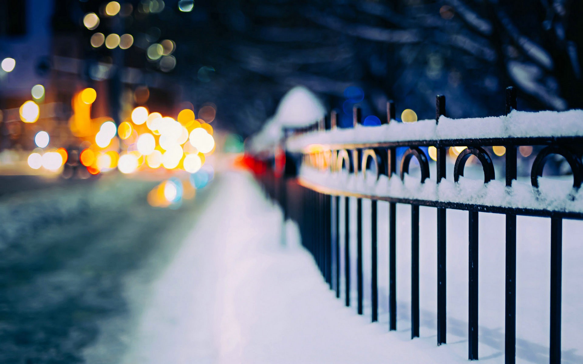 4551326-urban-snow-street-fence-bokeh-depth-of-field-lights-winter.jpg