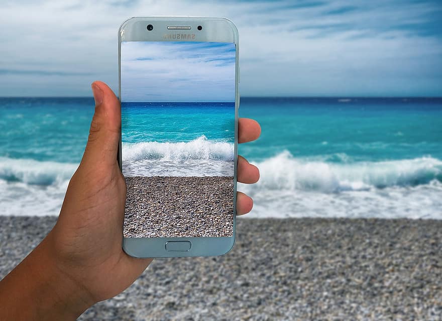 mobile-phone-sea-hand-smartphone-technology-water-ocean-travel-summer.jpg