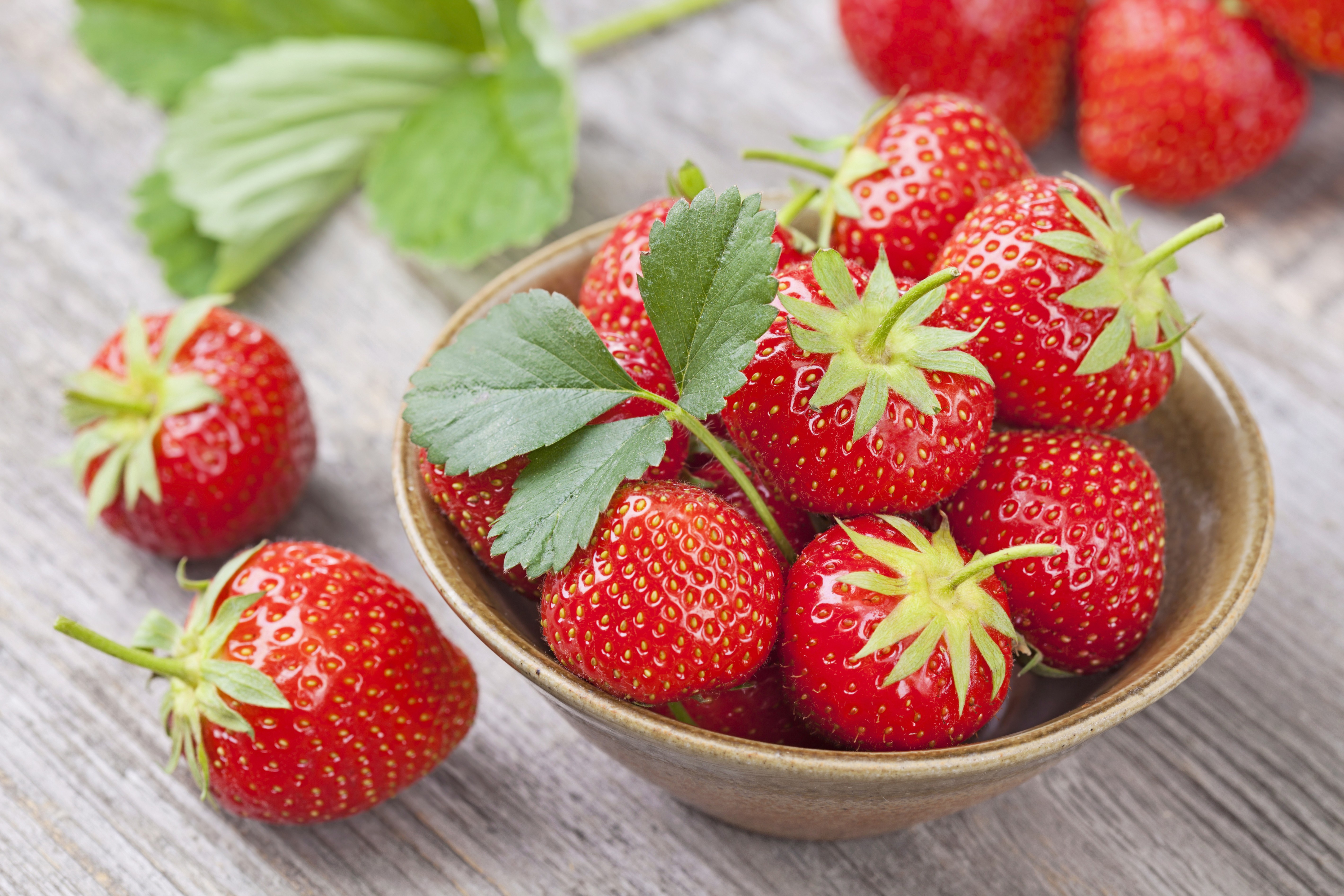 2020food-berries-and-fruits-and-nuts-red-ripe-sweet-strawberries-in-a-plate-with-green-leaves-140712.jpg